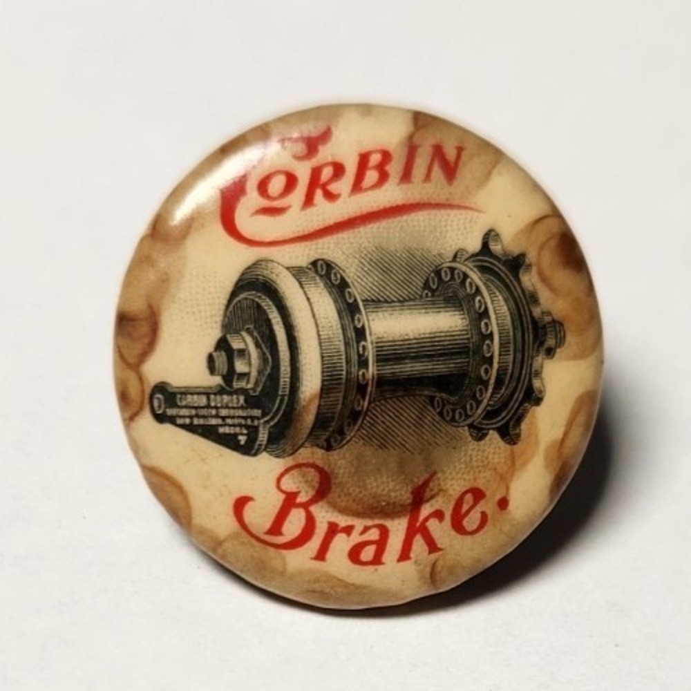 Early 1900's CORBIN BRAKE white celluloid 7/8" pinback w/paper Bike Bicycling